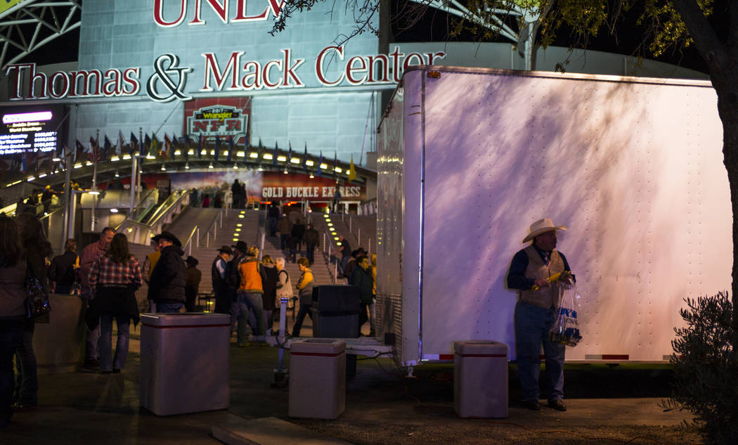 Attendees arrive for the second night of the National Finals Rodeo at the Thomas & Mack Center in Las Vegas on Friday, Dec. 8, 2017. Chase Stevens Las Vegas Review-Journal @csstevensphoto