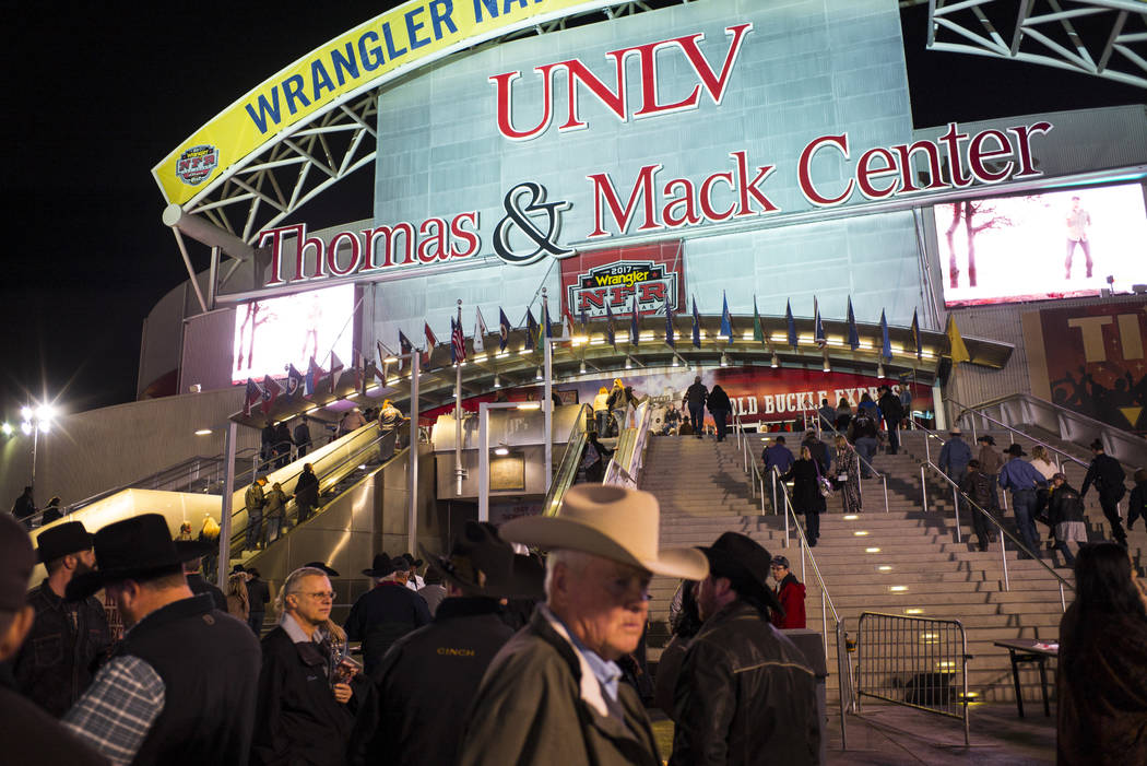 Attendees arrive for the second night of the National Finals Rodeo at the Thomas & Mack Center in Las Vegas on Friday, Dec. 8, 2017. Chase Stevens Las Vegas Review-Journal @csstevensphoto