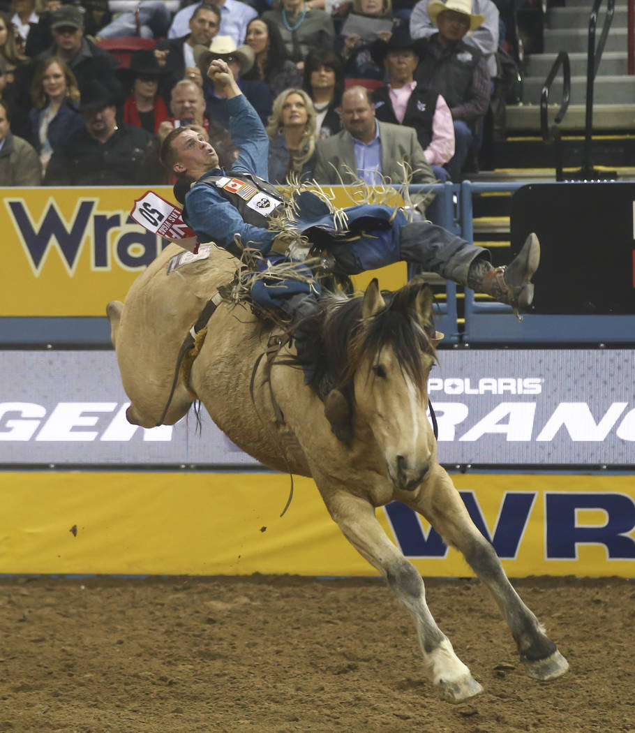 Orin Larsen competes in the bareback riding event during the second night of the National Finals Rodeo at the Thomas & Mack Center in Las Vegas on Friday, Dec. 8, 2017. Chase Stevens Las Vegas ...